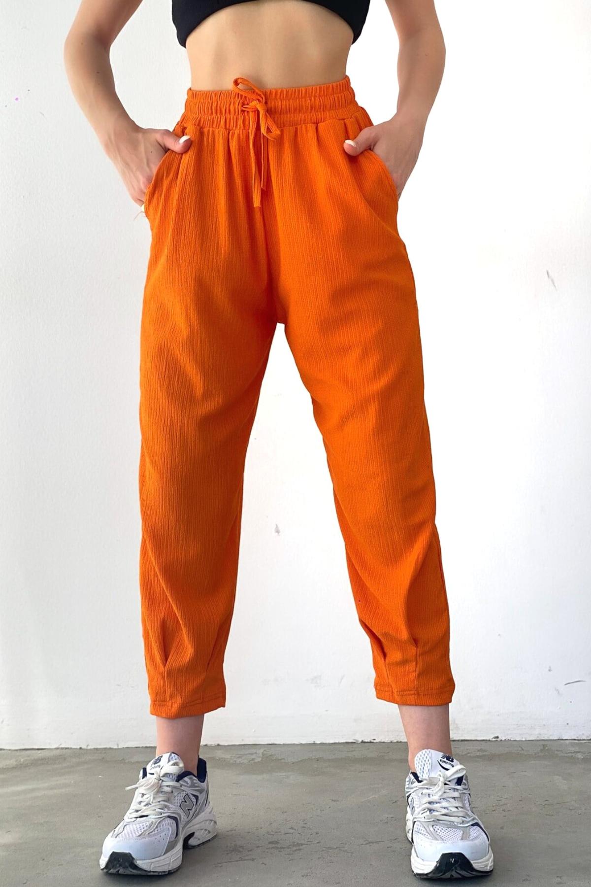 Kadın Turuncu Bel Lastikli Paçası Pensli Mevsimlik Jogger Pantolon