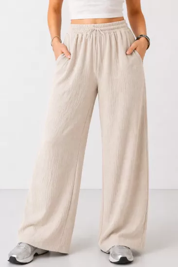Kadın Taş Beli Lastikli Cepli Bol Paça Mevsimlik Pantolon